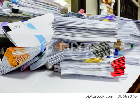 Busy, messy and cluttered workplace 39068070