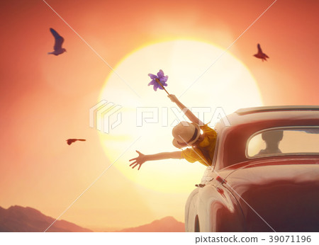 Girl enjoying road trip 39071196