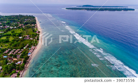 Aerial view of the blue water coast line. Aerial view of the blue water coast line. 39073556