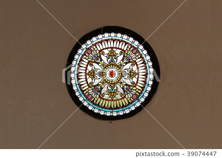 Church stained glass window brown concrete wall 39074447