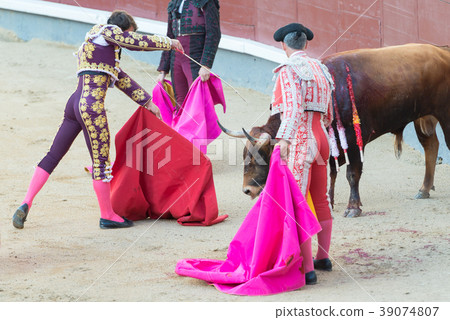 Corrida. Fighting in a typical Spanish Bullfight Corrida. Fighting in a typical Spanish Bullfight 39074807