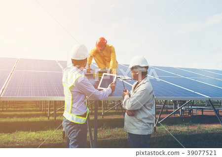 engineer and technician checking efficiency  39077521