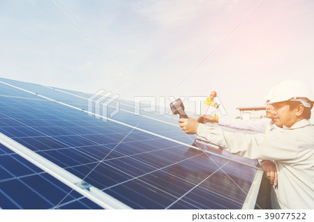 engineer and technician checking efficiency  39077522