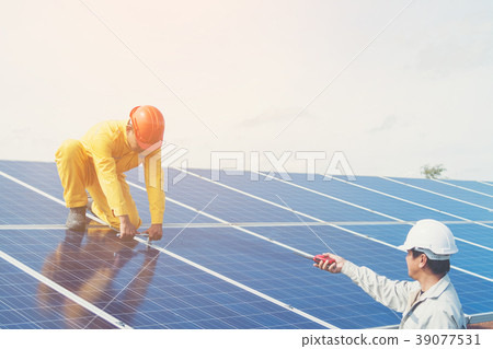 engineer and technician checking efficiency  39077531