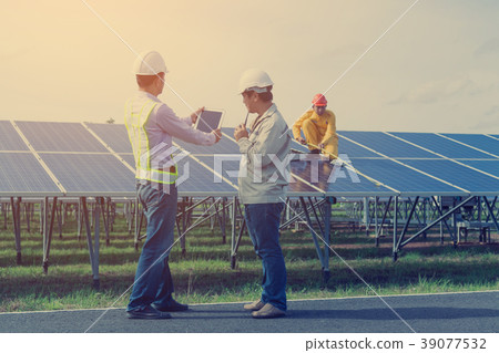 engineer and technician checking efficiency  39077532
