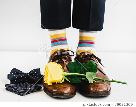 Wedding rings, rose and funny socks 39081309
