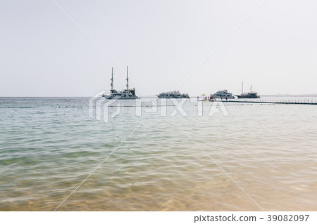a few passenger ships far on the horizon a few passenger ships far on the horizon 39082097