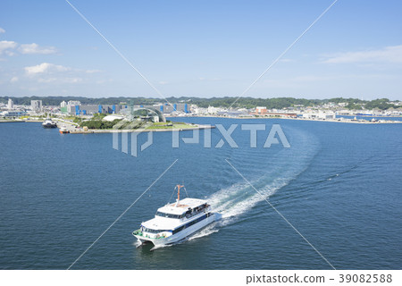 A view from the Marine Bridge overlooking Onahama Port and a sightseeing tour boat traveling on the beautiful Pacific Ocean A view from the Marine Bridge overlooking Onahama Port and a sightseeing tour boat traveling on the beautiful Pacific Ocean 39082588