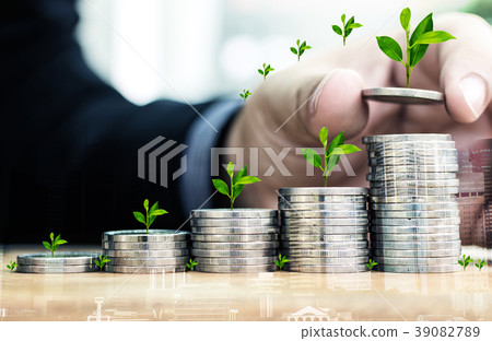 Businessman Hand Put Coins To Stack Of Coins Businessman Hand Put Coins To Stack Of Coins 39082789