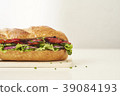 close up of fresh sandwich on plate of wood 39084193