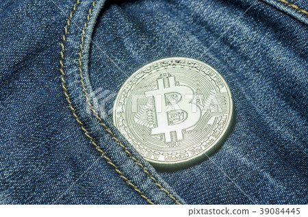 Bit coin in the pocket of black jeans 39084445
