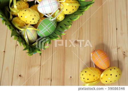 Eggs on textured wood background 39086346
