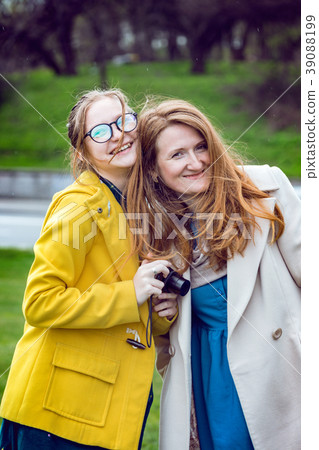 happy family - smiling mom and daughter happy family - smiling mom and daughter 39088199