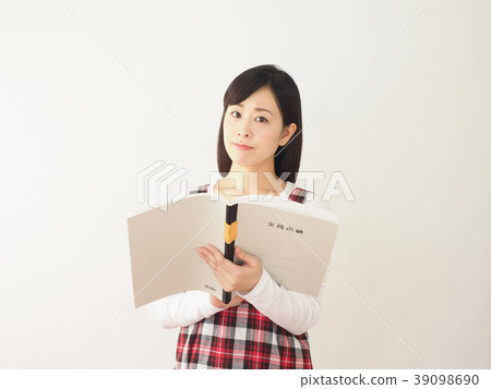 Troubled woman looking at a cash register Troubled woman looking at a cash register 39098690