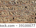 brick and stone medieval wall textured background 39100077