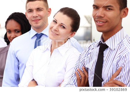 Group of young business people posing outdoor Group of young business people posing outdoor 39102869