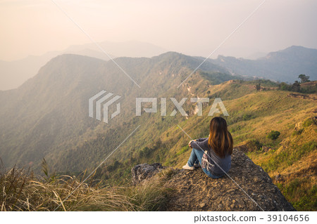 woman traveler looking at beautiful landscape 39104656