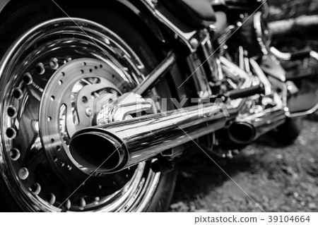 Rear view of motorcycle exhaust chrome pipes 39104664
