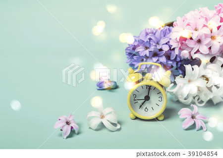 Spring Flowers Hyacinths and alarm clock 39104854
