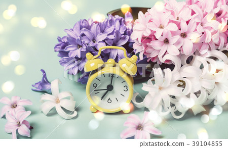 Spring Flowers Hyacinths and alarm clock 39104855
