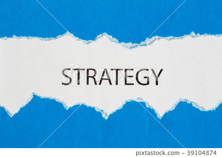 Word STRATEGY appearing behind torn paper 39104874