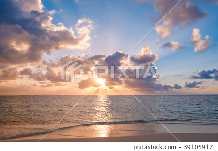 sunset sky , colorful clouds over ocean and beach 39105917