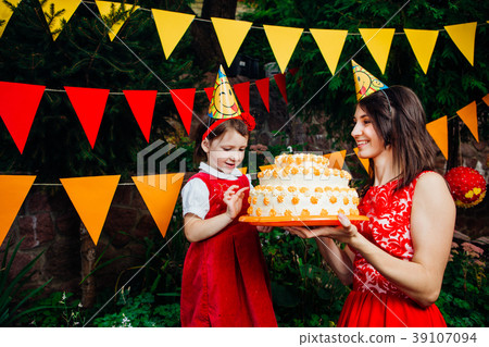 Children's party and cake. A small child of a 39107094