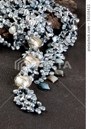 Vintage pearl necklace on black background Vintage pearl necklace on black background 39108421