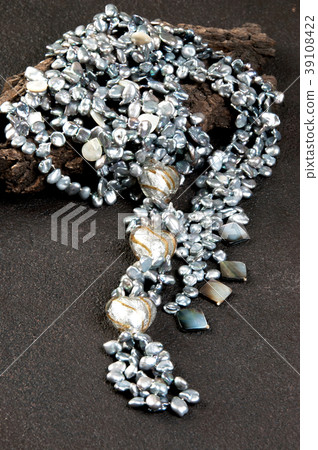 Vintage pearl necklace on black background Vintage pearl necklace on black background 39108422
