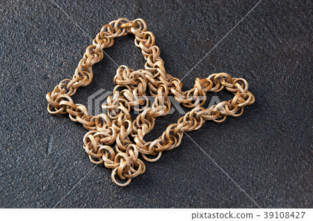 Vintage wooden necklace on black background Vintage wooden necklace on black background 39108427
