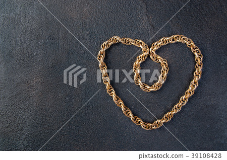 Vintage wooden necklace on black background Vintage wooden necklace on black background 39108428