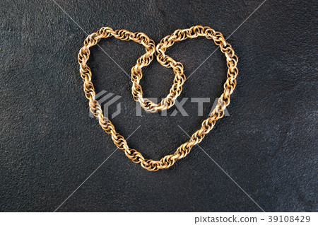 Vintage wooden necklace on black background Vintage wooden necklace on black background 39108429