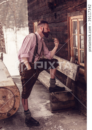 Bavarian man smoking Bavarian man smoking 39117342