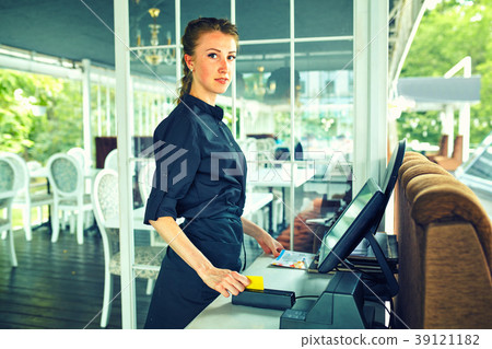 Waiters carrying plates with food, in restaurant. Waiters carrying plates with food, in restaurant. 39121182