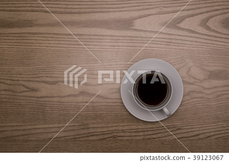 A cup of coffee on the table A cup of coffee on the table 39123067