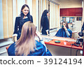 Picture showing hairdresser holding scissors  39124194