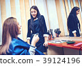 Picture showing hairdresser holding scissors  39124196