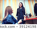 Picture showing hairdresser holding scissors  39124198