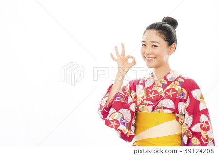 A woman in a yukata A woman in a yukata 39124208