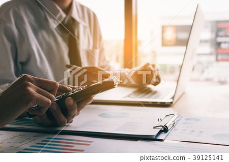 Close up businessman calculate about cost Close up businessman calculate about cost 39125141
