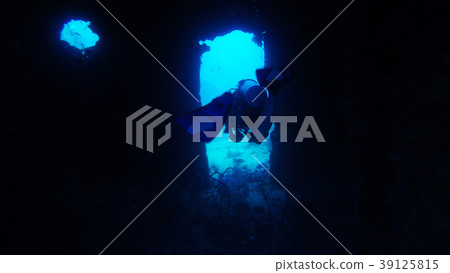 Diver infiltrating a sunken ship 39125815