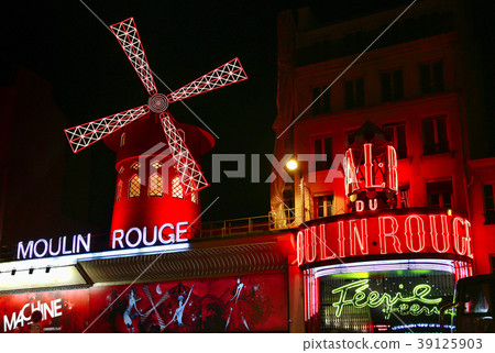 View of the Moulin Rouge at night in Paris, France 39125903