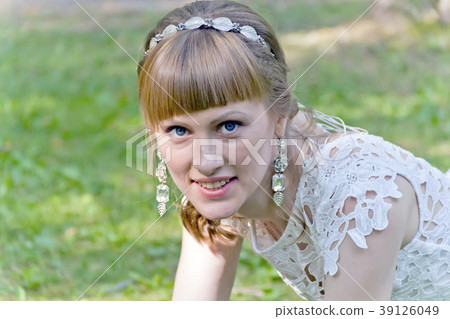Beautiful bride in white lace dress of summer time 39126049