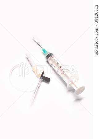 Medical syringe closeup with catheter on white bac Medical syringe closeup with catheter on white bac 39126512