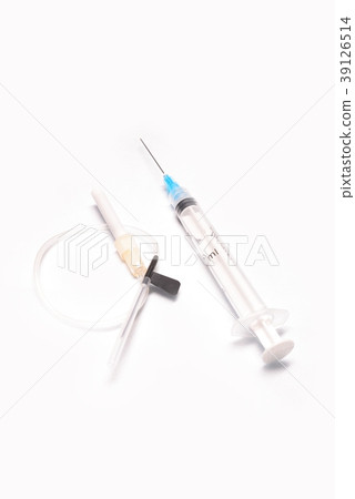 Medical syringe closeup with catheter on white bac Medical syringe closeup with catheter on white bac 39126514