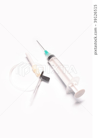 Medical syringe closeup with catheter on white bac 39126515