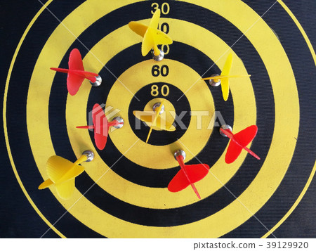 red dart In a dartboard 39129920