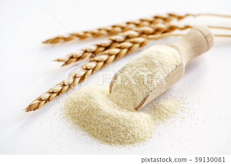 Raw unprepared semolina in bowl Raw unprepared semolina in bowl 39130081