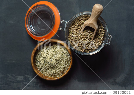hemp seeds on the black background hemp seeds on the black background 39130091