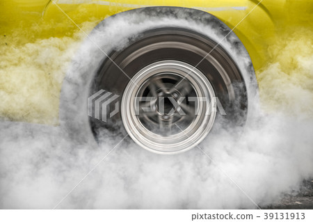 Drag racing car burn tire at starting line. Drag racing car burn tire at starting line. 39131913